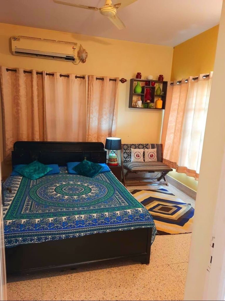 Manage laundry in a PG with organized clothes and drying setup